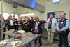 Oswin Project founder Fiona Sample (centre) celebrates opening the bakery