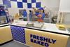An Auntie Anne's staff member prepares a pretzel to be fresh baked at the Watford store  2100x1400