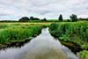 The River Nar, a tributary of the River Great Ouse, runs through fields in East Anglia   WRAP  2100x1400