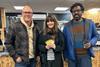 Romesh Ranganathan (right) stands with Coughlans Bakery MD Sean Coughlan and raffle prize winner Kerrie at the Maidenbower shop in Crawley  - Coughlans Bakery  2100x1400