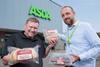 Murdoch Allan MD Paul Allan(left) and Asda Peterhead store manager Eric Falconer hold some of the new product range.  2100x1400