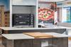 Work stations and an oven inside Eurostar Commodities school of pizza