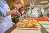 Jersey Mike's Subs - Sprinkling 'juice' on freshly prepared sandwiches