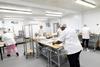 Half the Story - Workers produce biscuits at the new Nottingham production site