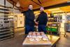 Deep North - Owner Phil King (right) shakes hands with UMi specialist adviser Phil Sly inside the new Ouseburn bakery site