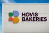 Hovis Bakeries new sign on a building against a blue background