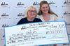 Michelle and daughter Ashley collecting the cheque