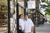 Honey & Co. co-founders Sarit Packer and Itamar Srulovich stand outside their Lamb's Conduit Street restaurant. 2100x1800