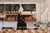 Northern Rye bakery counter with staff stocking sourdough
