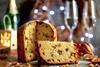 A festive panettone with a slice taken out