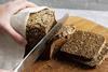 Rye bread being sliced