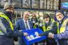 Scottish Bakers training and development manager Scott Anderson, gives away cupcakes at Waverley Station in Edinburgh as part of the 2024 Scottish Baker of the Year launch - Scottish Bakers - 2100 x 1400