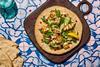 Deli Kitchen's new Lebanese Style Flatbread topped with grilled halloumi, cucumber, rocket, mint and pomegranate  2100x1400