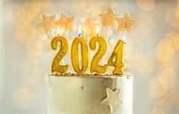 A celebration cake with 2024 candles on top