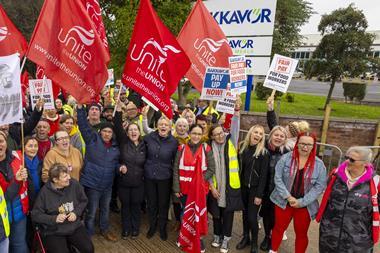 Workers on strike holding signs outside Bakkavor Spalding strike action