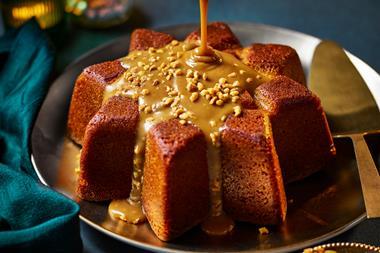 Salted banoffee star dessert with salted caramel sauce being poured over it