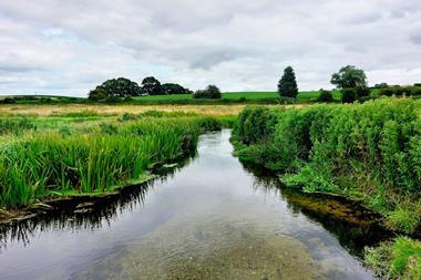 The River Nar, a tributary of the River Great Ouse, runs through fields in East Anglia   WRAP  2100x1400