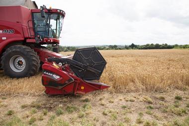 Combine harvester in operation at a farm which supplies wheat for ADM flour  2100x1400