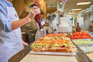Jersey Mike's Subs - Sprinkling 'juice' on freshly prepared sandwiches