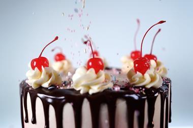 Sweet Nothing Bakehouse's The Neopolitan Cake, a dark chocolate drip cake with cherries