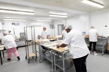 Half the Story - Workers produce biscuits at the new Nottingham production site