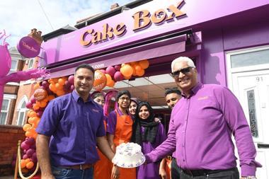 Cake Box CEO Sukh Chamdal (right) at the opening of its 200th franchise store in Sneinton, Nottingham, in September 2022.