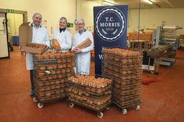 Three people inside a pork pie factory