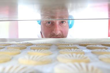 James Shepherd eyes a tray of Aberffraw biscuits  2100x1400