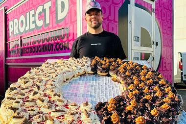 1. Project D Creative Director Matt Bond with the UK's biggest doughnut