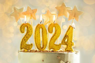 2024 golden candles on a cake