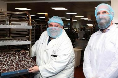 BCRS Business Loans - The Pudding Compartment founder Steve West (left) with BCRS Business Loans business development manager James Pittendreigh