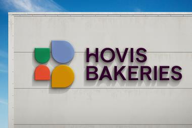 Hovis Bakeries new sign on a building against a blue background