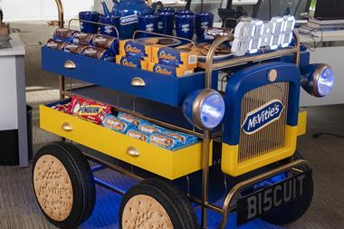 McVitie's customised tea trolley stocked with biscuits including Chocolate Digestives, Jaffa Cakes, Hobnobs, and Penguins  2100x1400