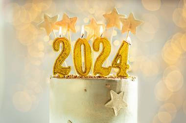 A celebration cake with 2024 candles on top