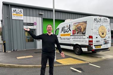 Mud Foods founder Christian Barrington stands in front of the new production unit at St James Industrial Estate in Chichester  - 2100x1400