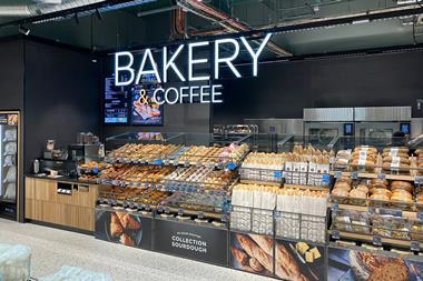 M&S Bakery & Coffee  sign above a well-stocked in-store bakery