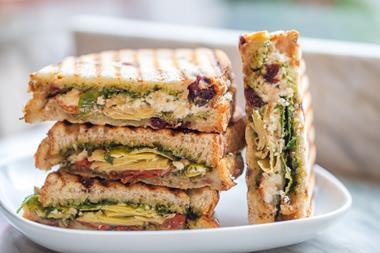 A vegetarian toasted sandwich on a plate