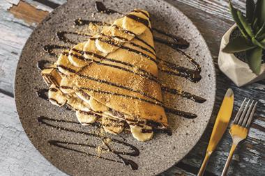 Crepe with chocolate sauce and banana