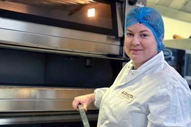 Mary Murphy, test baker at Aryzta, with a sourdough loaf fresh out of the oven