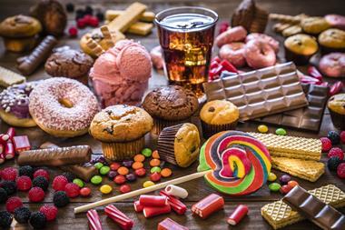 Lots of sweets, muffins, doughnuts, ice cream, and cola