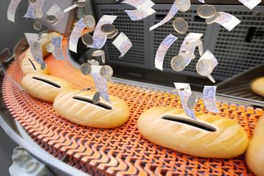 Bread on an industrial line with money