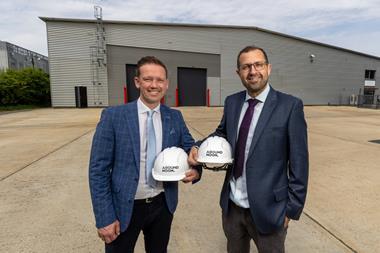 Around Noon CEO Gareth Chambers (left) and operations director Wesley Jenkins stand in front of the company's new manufacturing site at Slough Trading Estate. 2100x1400
