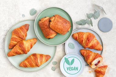 Vegan croissants, pain au chocolat, and raspberry croissants on plates