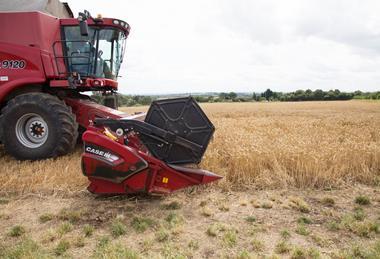 Combine harvester in operation at a farm which supplies wheat for ADM flour  2100x1400