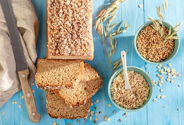 Bran bread with wheat and oats next to it