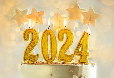 2024 golden candles on a cake