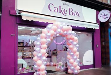 New branding at the Cake Box store front on Dukes Street in Glasgow - Cake Box