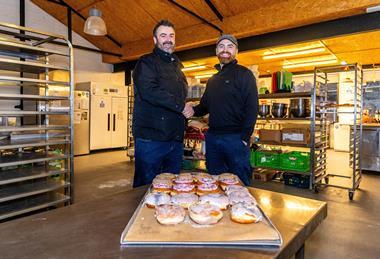 Deep North - Owner Phil King (right) shakes hands with UMi specialist adviser Phil Sly inside the new Ouseburn bakery site