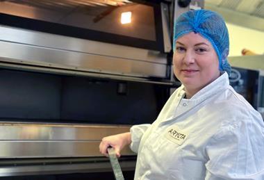 Mary Murphy, test baker at Aryzta, with a sourdough loaf fresh out of the oven