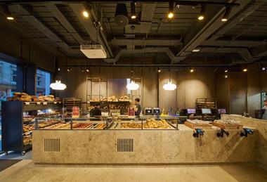 Ole & Steen bakery counter neatly filled with pastries